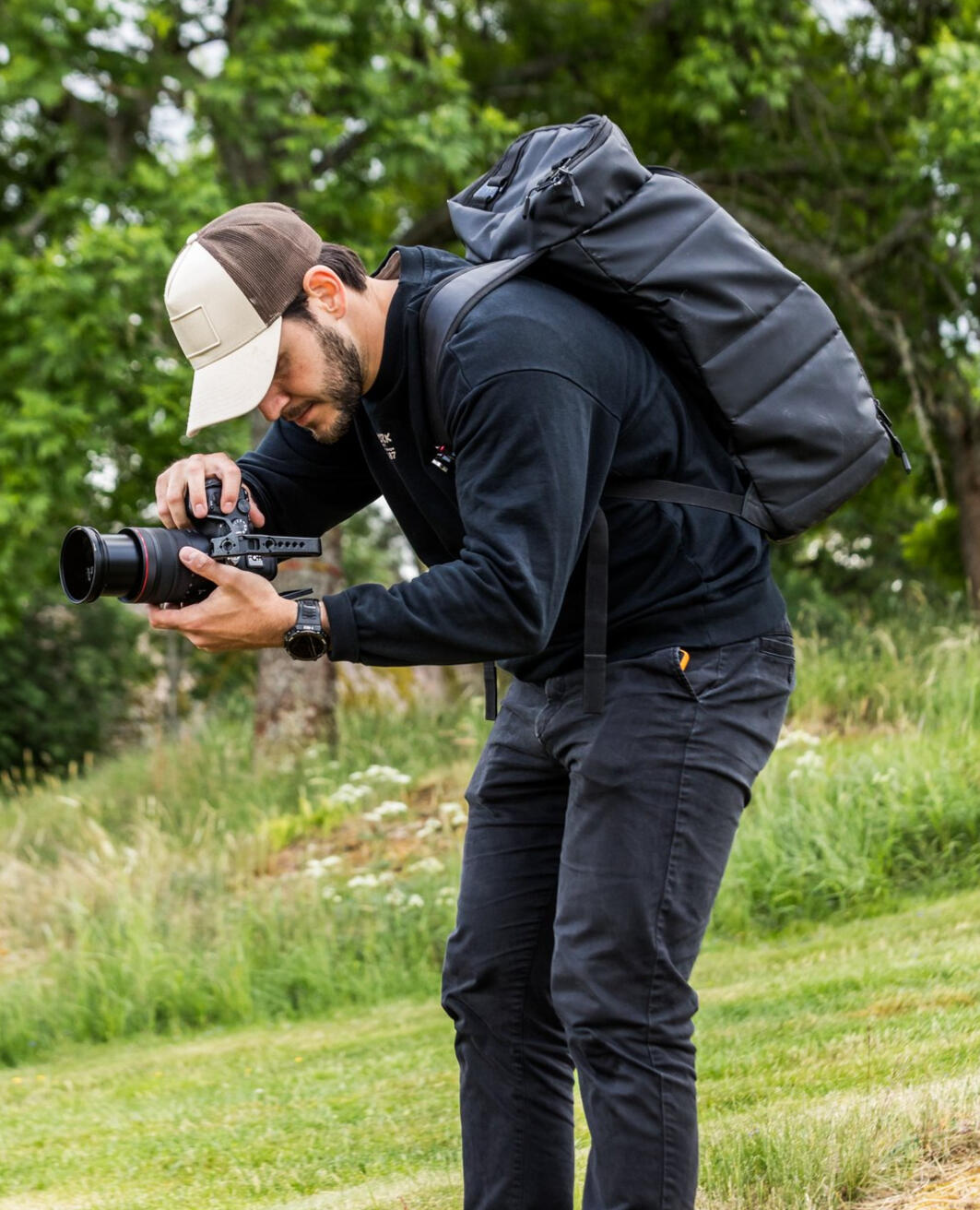 A man holding a video camera